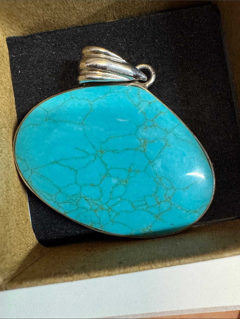 Double  sided Sterling Silver pendant with turquoise and Abalone .